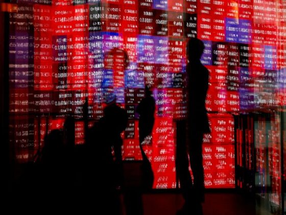 Asia stocks gain, bonds fall as traders judge odds of bigger Fed cut