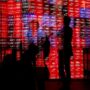 Asia stocks gain, bonds fall as traders judge odds of bigger Fed cut