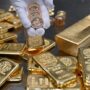 Gold breaches record ,600 as Fed rate cut bets intensify