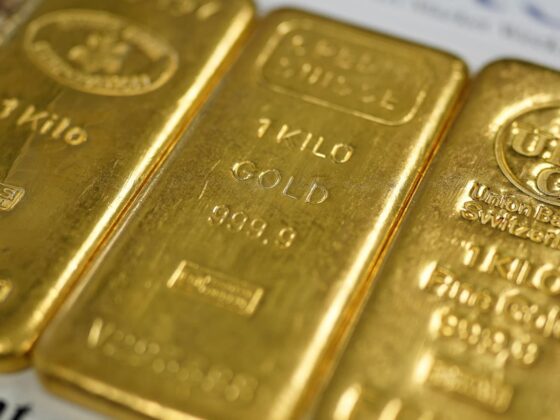 Gold hits new high on rising uncertainty, while U.S. stock futures little changed