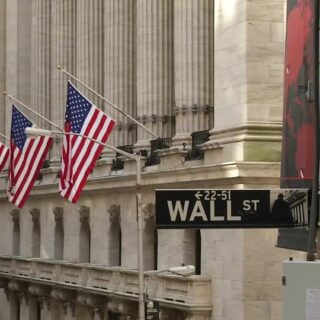 Nasdaq notches record high close, traders look to Fed meeting