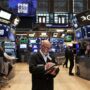 Wall St indexes open mixed after jobs data; Salesforce falls