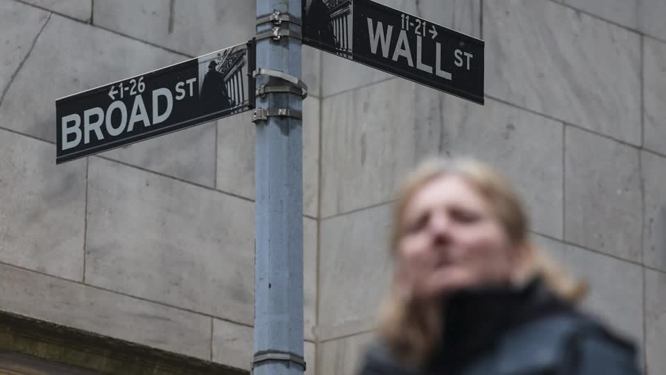 Wall Street ends lower ahead of Fed rate decision